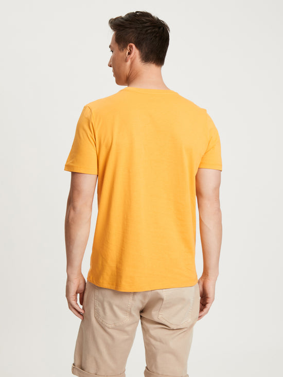 Men's regular T-shirt with label emblem, mustard yellow.