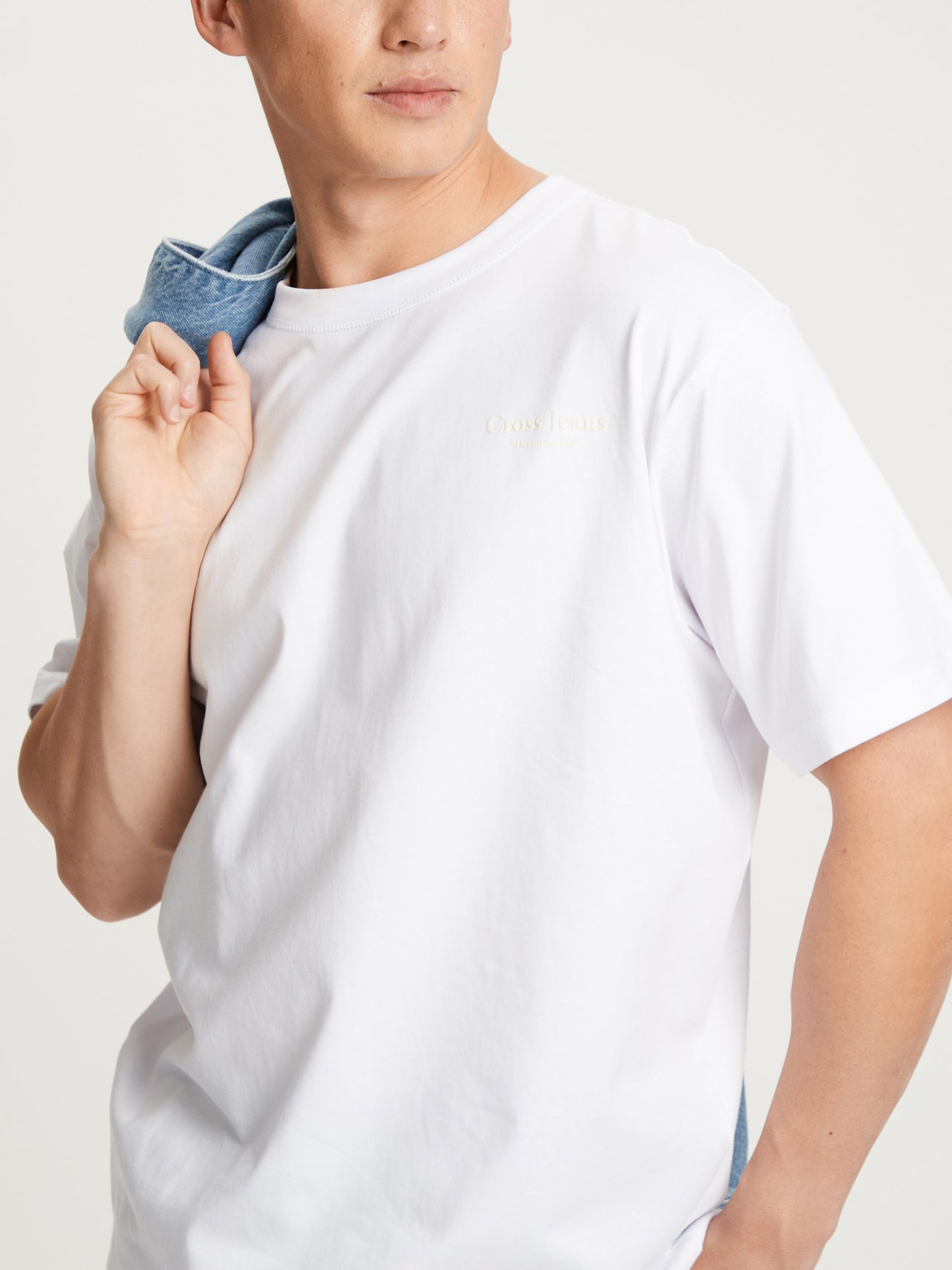 Men's relaxed round neck t-shirt in white.