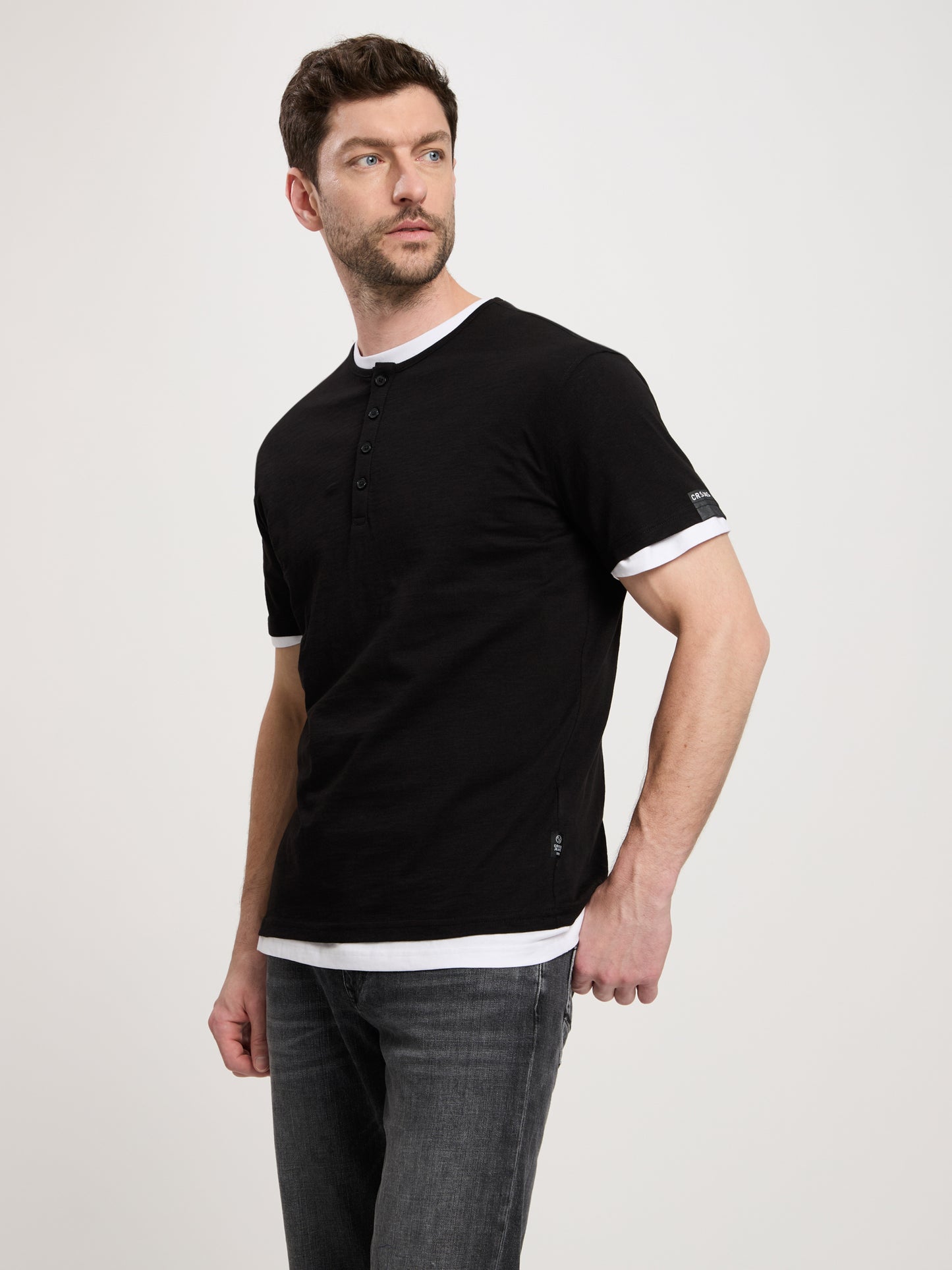 Men's regular T-shirt with short button placket, black.