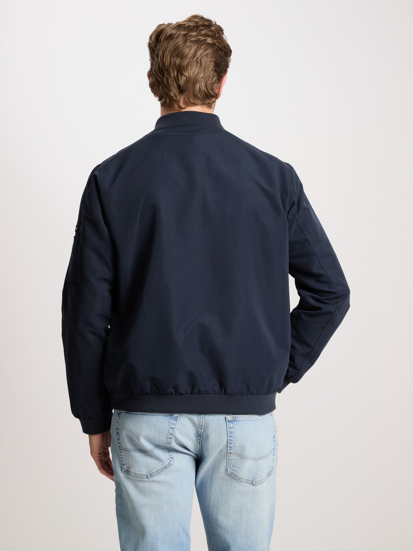 Men s regular zip bomber jacket with zip pockets navy blue. CROSS JEANS