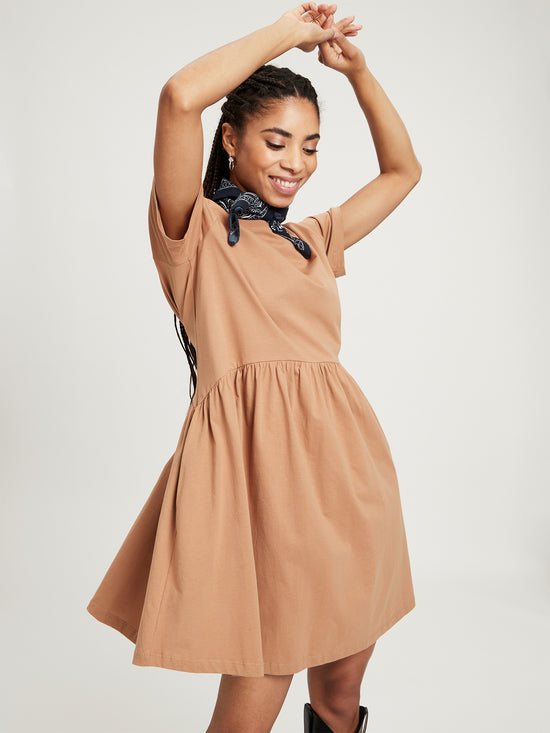 Women's relaxed jersey dress with pleated skirt, tobacco brown.