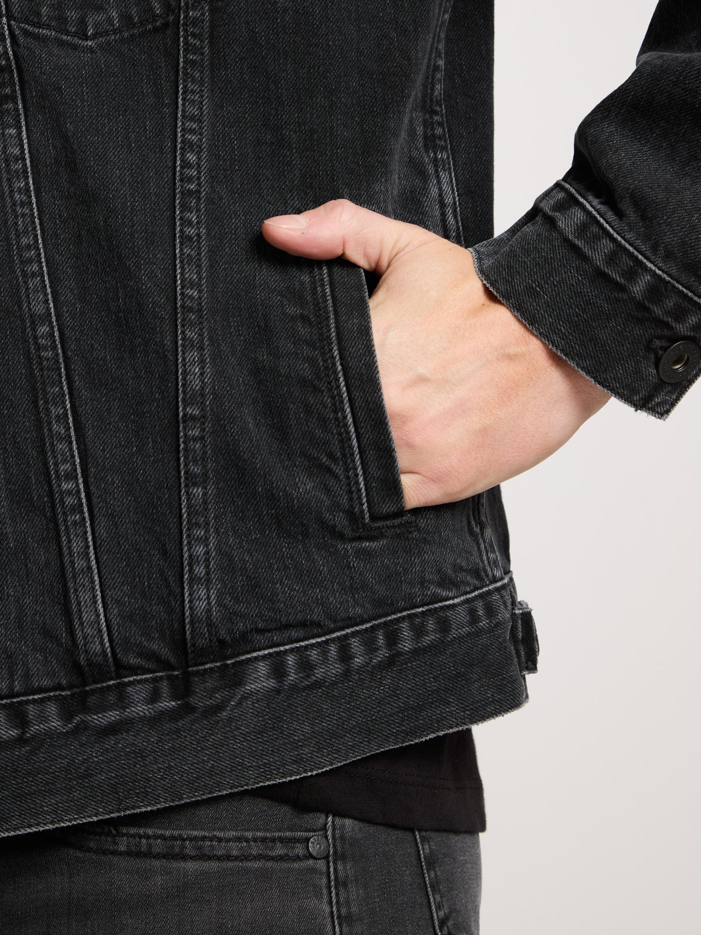 Men's regular denim jacket with button placket, black.